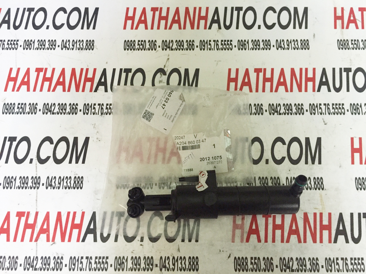 Vòi phun nước rửa đèn pha trái xe Mercedes C300, C350 W204 - 2048600347